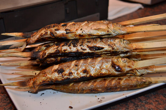 Steckerlfische - eine gegrillte Fischspezialit&auml;t im Salzkammergut, &Ouml;sterreich, Europa - Stick fish - a grilled fish specialty in the Salzkammergut, Austria, Europe
