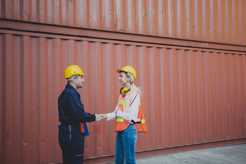 worker staff shaking hand for sucess working at Container. workers prepare export products. Container Shipping Logistics Engineering of Import Export Transportation Industry