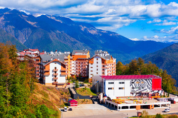 Buildings in Rosa Plateau mountain village. Rose Plateau and Roza Khutor are alpine ski resorts near Krasnaya Polyana town in Sochi region, Russia. © saiko3p
