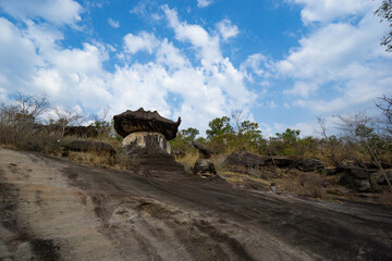 Phu Pha Thoep National Park a small protected area in Mukdahan Province east of Thailand near the border to Laos with cloudy blue sky background