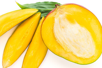 Red ripe mango fruit and slices isolated on white background. Tropical fruit mango close up studio shot