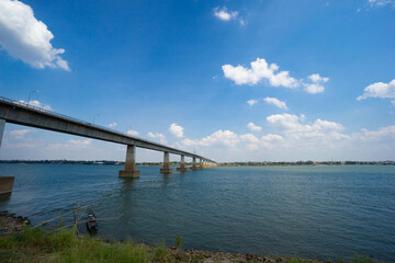 Fototapeta na wymiar Landscape ofThai-Laos Friendship Bridge II Viewpoint at Mekong river in cloudy blue sky background