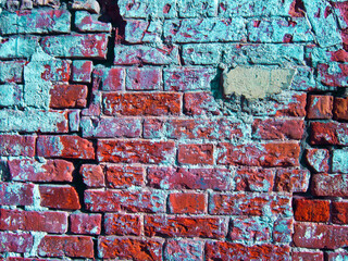 Decoratively aged red brick wall.