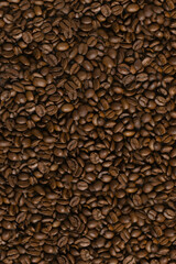 Background from coffee beans of brown color. Coffee concept. Top view.