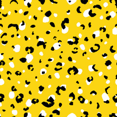 Abstract modern leopard seamless pattern. Animals trendy background. Yellow and black decorative vector stock illustration for print, card, postcard, fabric, textile. Modern ornament of stylized skin