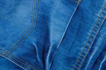 Bright denim with a neatly stitched seam.