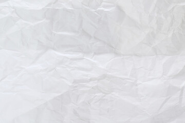Crumpled white paper sheet texture