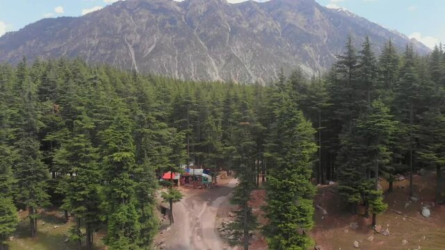 Aerial View Of Road At Ushu Forest At Kalam In Pakistan. Dolly Back