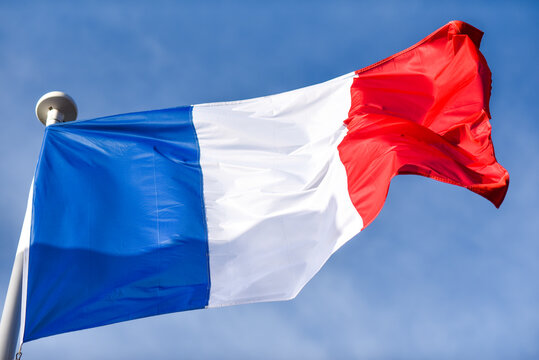 .France flag waving in the wind. Viva france, viva republic.