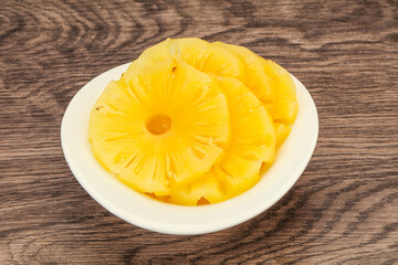 Marinated pineapple rings in the bowl