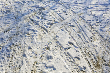 Shoe tracks on snow and traces of the tread