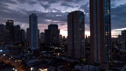 Sunset in big city Goiania, in Brazil. Skyline in dusk with skyscrapers.
