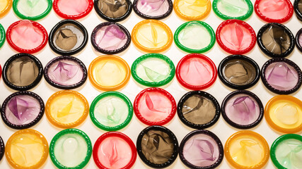 Colorful condoms background.