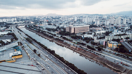 Fototapeta premium Tiete river in Sao Paulo, Brazil. Beautiful aerial view during sunset
