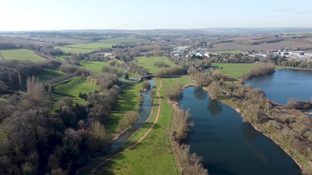 Aerial pull back above River Stour British Chartham Kent countryside rural landscape