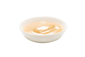 Mushroom sauce in a bowl isolated on white background.