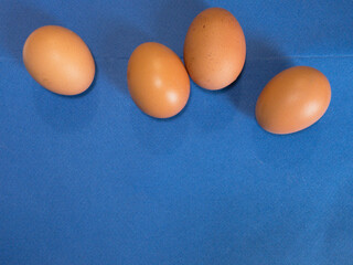 closeup of organic eggs on background