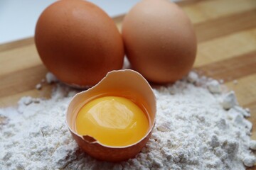 Chicken eggs and baking flour