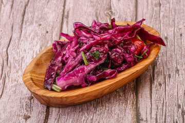 Obraz premium Pickled red cabbage with herbs