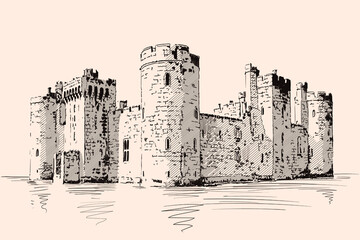 Medieval stone castle with towers and arches on the sea shore. © migfoto