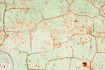 Texture of a concrete wall with cracks and scratches which can be used as a background