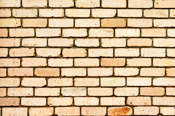 Obraz premium Texture of a brick wall with cracks and scratches which can be used as a background
