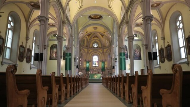 Walking down the center isle of the majestic sanctuary of the St. Columban's Church in Cornwall, Ontario, Canada.