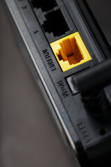 Yellow Internet connector for connection to the network, Wi-Fi router for Internet access