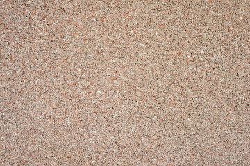 Granite wall. Small stone texture.