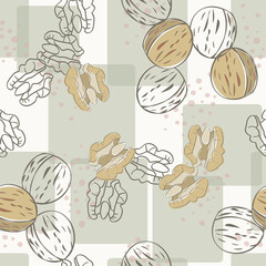 Vector Nuts Walnuts in Brown Tan on Green Squares Background Seamless Repeat Pattern. Background for textiles, cards, manufacturing, wallpapers, print, gift wrap and scrapbooking.