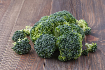  A lot of broccoli for diet and healthy eating. Fresh green broccoli on a   table.Broccoli...