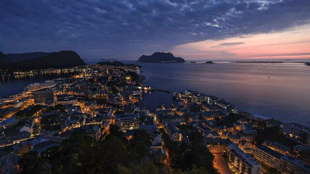 View of &Aring;lesund (Norway) from Aksla Viewpoint. Sunset Motion Time Lapse in ProRes.
Popular European Tourist Destination with Art Noveau Architecture and Beautiful Nature
