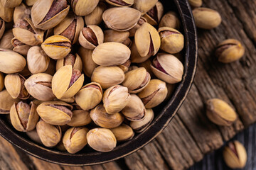 Organic pistachios. Pistachios in shell. Food background.