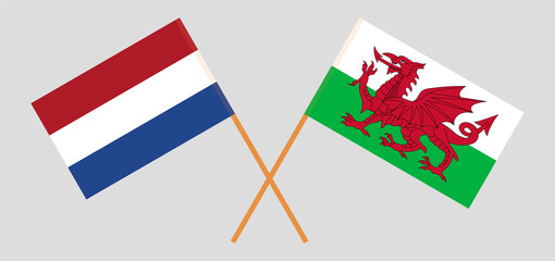 Crossed flags of the Netherlands and Wales. Official colors. Correct proportion