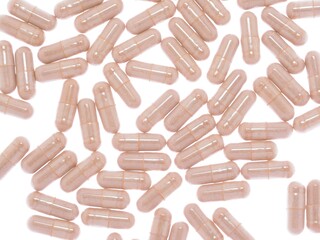 Cat's Claw plant powder capsules  isolated on white