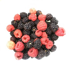 Raspberry and blackberry fruits close-up.