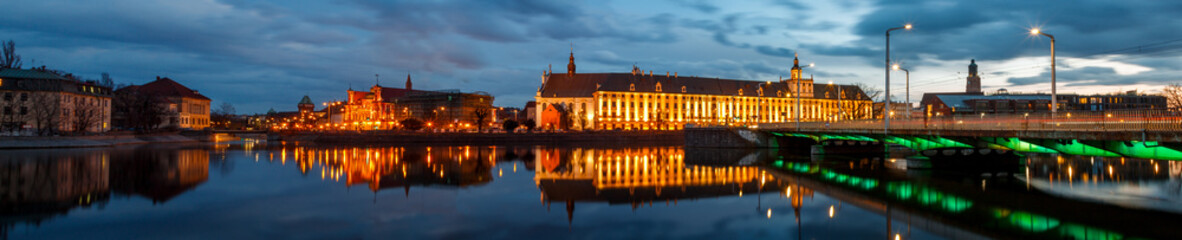 night view of the river and the old districts of the city of wroclaw in poland