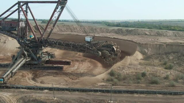 An old large bucket-wheel rotary excavator. Manganese ore mining. 