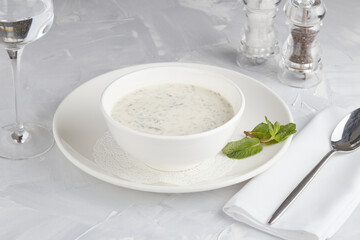 Soup with sour milk, egg and fresh green