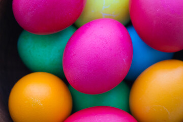Easter eggs close up. Happy Easter holiday. Colorful painted eggs. Bright boiled eggs. Easter traditional decoration. Christian holiday. Easter celebration. Spring holidays concept. 