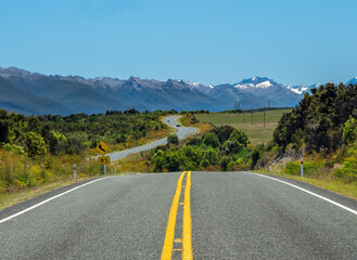 Winding stretch of road on New Zealand’s State Highway 94, known as Milford Road.