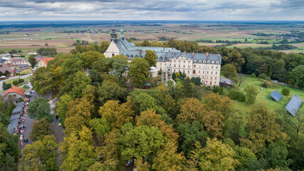 Fototapeta na wymiar A magnificent monastery with a basilica and a sanctuary on St. Anne's Mountain, a place of Christian worship in Poland in the province Silesia, aerial photos