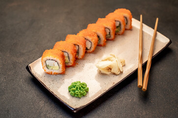 Sushi roll - california on a stone background