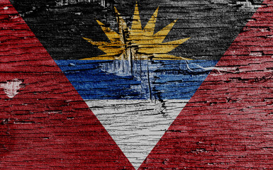 Antigua and Barbuda flag on old wooden board