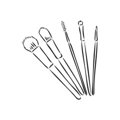 Make up brushes on the beige background for beauty salon.