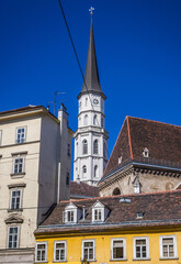 Fototapeta na wymiar Buildings in historic part of Vienna capital city,view with tower of St Michael church, Austria