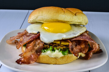 turkey burger  with bacon  and egg