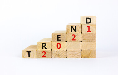 Business concept of 2021 new year trend. Wooden blocks with words 'Trend 2021'. Beautiful white...
