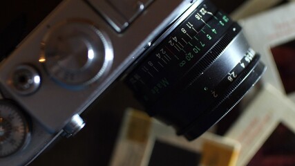 Close up of vintage film camera and slide films