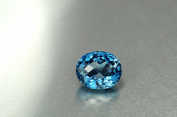 Natural swiss blue topaz. Oval cut, checkers faceted, loupe clean - VVS,IF,FL. Heated, treated,...